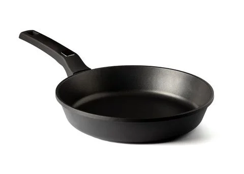 Frying pan with non-stick coating isolated on white background. New kitchen Stock Photos