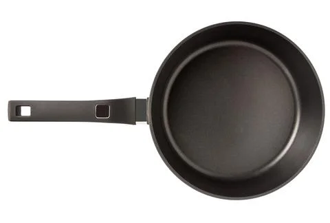 Frying pan with non-stick coating isolated on white background. New kitchen Stock Photos