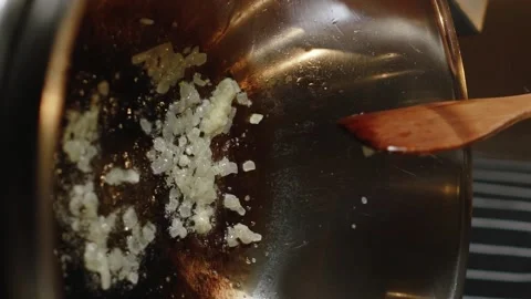Frying pan with onions. Slow motion. 120 fps. Vertical video Stock Footage 172439956