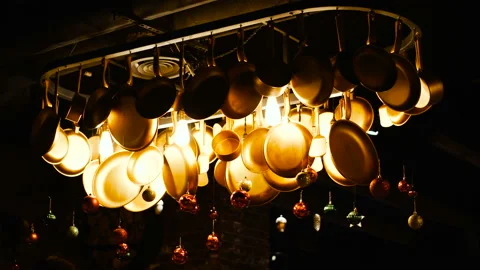 Frying pan. Pans hang on the wall. Video stock 100739971