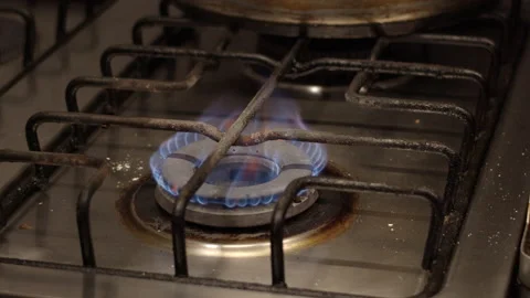 Frying pan placed on gas stove Video stock 238640482