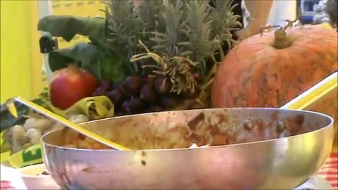 Frying pan with pumpkin and ecological dishes in mater b Stock Footage 118834472
