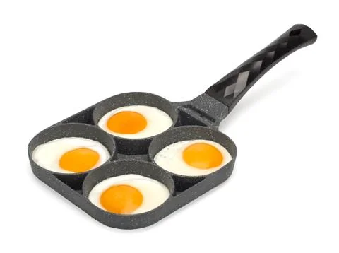 Frying pan with scrambled eggs top view. Isolated on white Stock Photos