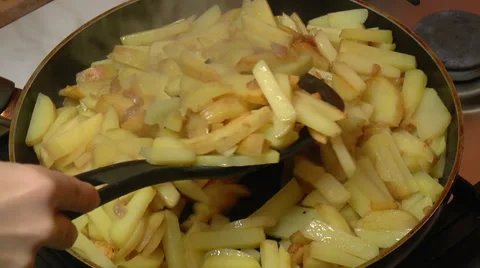 Frying Pan with Sliced Potatoes Stock Footage 39818628