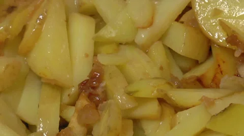 Frying Pan with Sliced Potatoes Stock Footage 39818635
