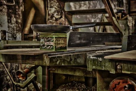 Frying pan in a workshop, under a staircase HDR Stock Photos