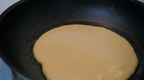 Frying a Pancake in a Skillet Stock Footage 66918766