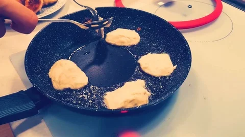 Frying pancakes Stock Footage 127271720