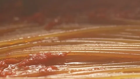 Frying Pasta with Tomato Sauce. Stock Footage 265857001