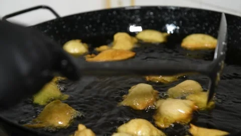 Frying Pettole - Typical dish of South of Italy Stock Footage 139924666