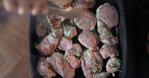 Frying pieces of beef in a pan Stock Footage 146751232