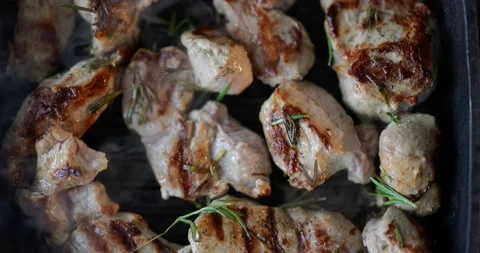 Frying pieces of beef in a pan Stock Footage 146752059