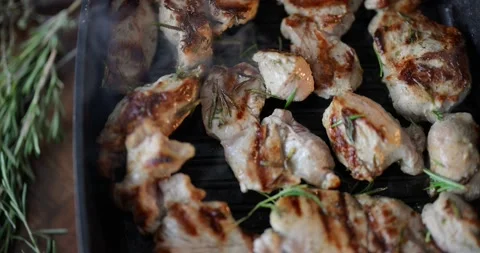 Frying pieces of beef in a pan Stock Footage 146752179