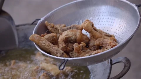 Frying pieces of fish Stock Footage 48988226