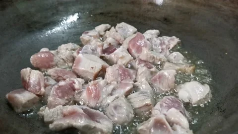 Frying Pork Belly Cutlets on a Heated Oil Stock Footage 157676527