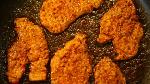 Frying pork Stock Footage