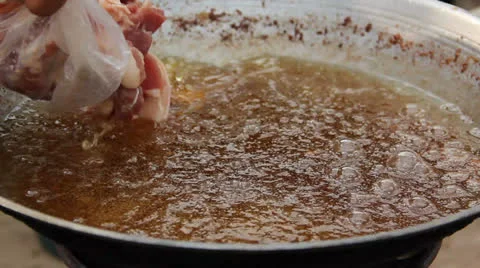 Frying pork Stock Footage 25918954