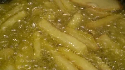 Frying Potatoes - close up (3) Stockbeeldmateriaal 22340889