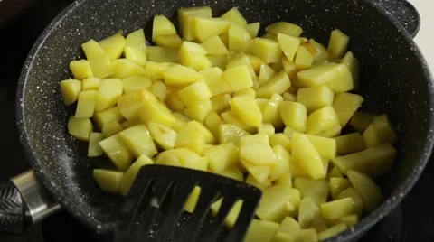 Frying potatoes Stock Footage 49781926