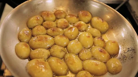 Frying potatoes Stock Footage 71720094