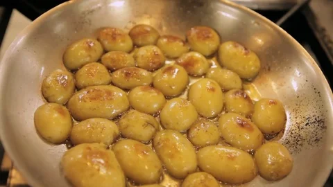 Frying potatoes Stock Footage 77759861