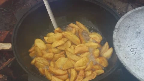 Frying potatoes outside. Top view Stock-Footage 332290548