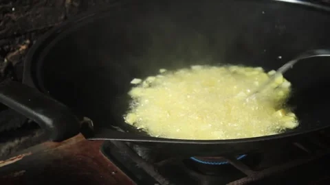 Frying potatoes in a skillet Video stock 277309450