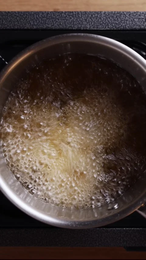 Frying Process In Boiling Oil Saucepan Top View Видео 331373199