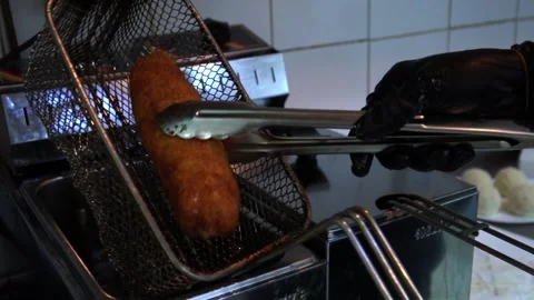 Frying Process in Kitchen Stock Footage 318303840