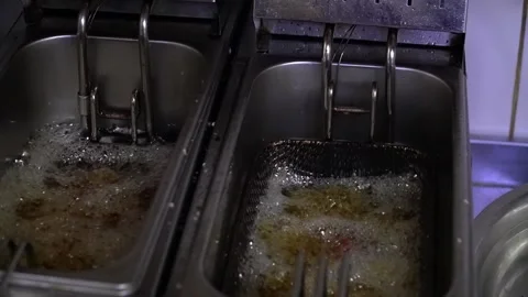 Frying Process in Kitchen Video stock 319949410