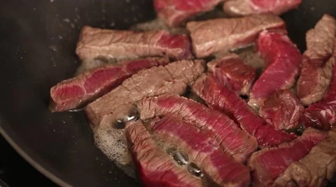 Frying raw meat, close up Stock Footage 57311610