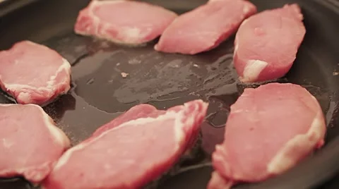 Frying Raw Meat Stock-Footage 7751130