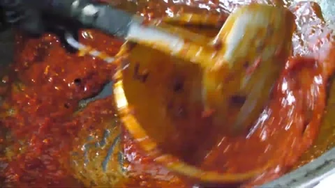 Frying Red Chili Paste in Hot Oil, Cooking Asian Sauce Stock Footage Stock Footage 343027952
