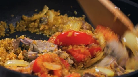 Frying Rice Pilaf Stock Footage 125348426