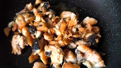 Frying salmon scraps Stock Footage 313513536