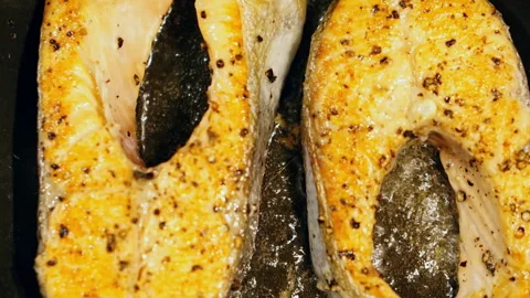 Frying salmon in a time lapse pan. Video stock 267720828