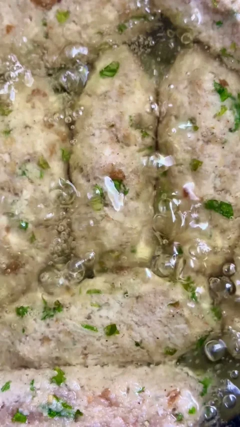 Frying savory meat rolls in hot oil in pan Video stock 331981277