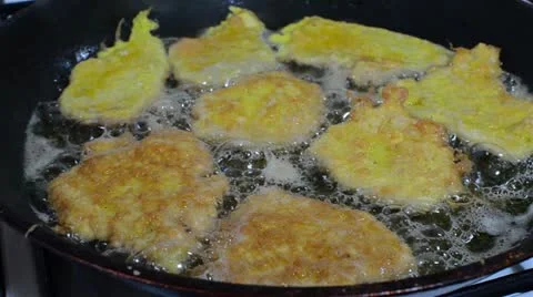Frying schnitzel 1 Stock Footage 12759894