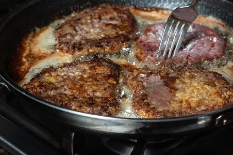 Frying Schnitzel Stock Photos