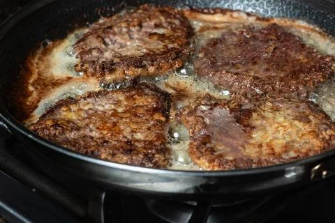 Frying Schnitzel Stock Photos