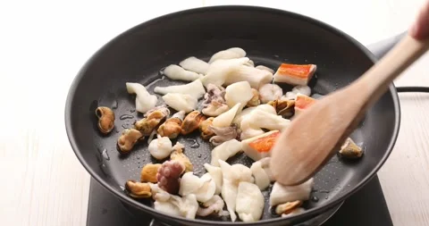 Frying seafood. Stock Footage 250105645