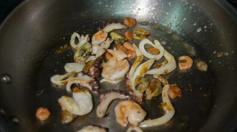 Frying seafood on the hot pan Video stock 68317337