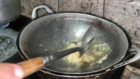 Frying spices Stock Footage 303561388