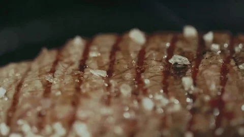 Frying steak in a frying pan Stock-Footage 76602300