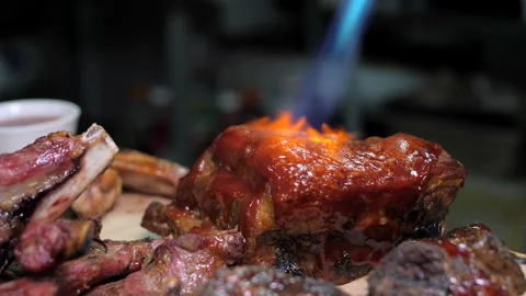 Frying a steak with a gas burner Stock Footage 146924583