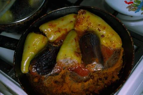 Frying Stuffed Peppers and Eggplant Stock Photos