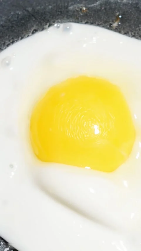 Frying Sunny Side Up Egg in Hot Pan Close Up Stock Footage 345843376