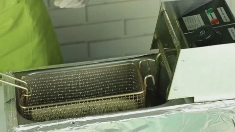 Frying sushi in a fryer Stock Footage 180632743
