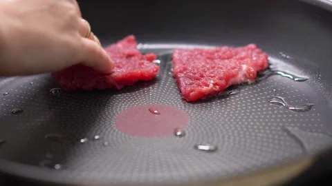 Frying Tenderized Steak on Pan. Stock Footage 255252684