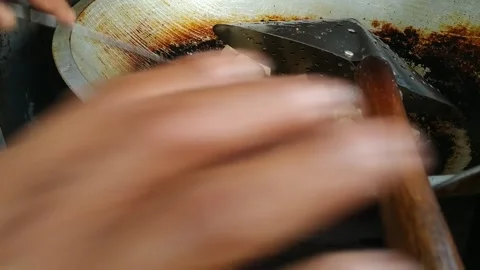 Frying tofu as a complement to "kupat tahu" Stock-Footage 159577493